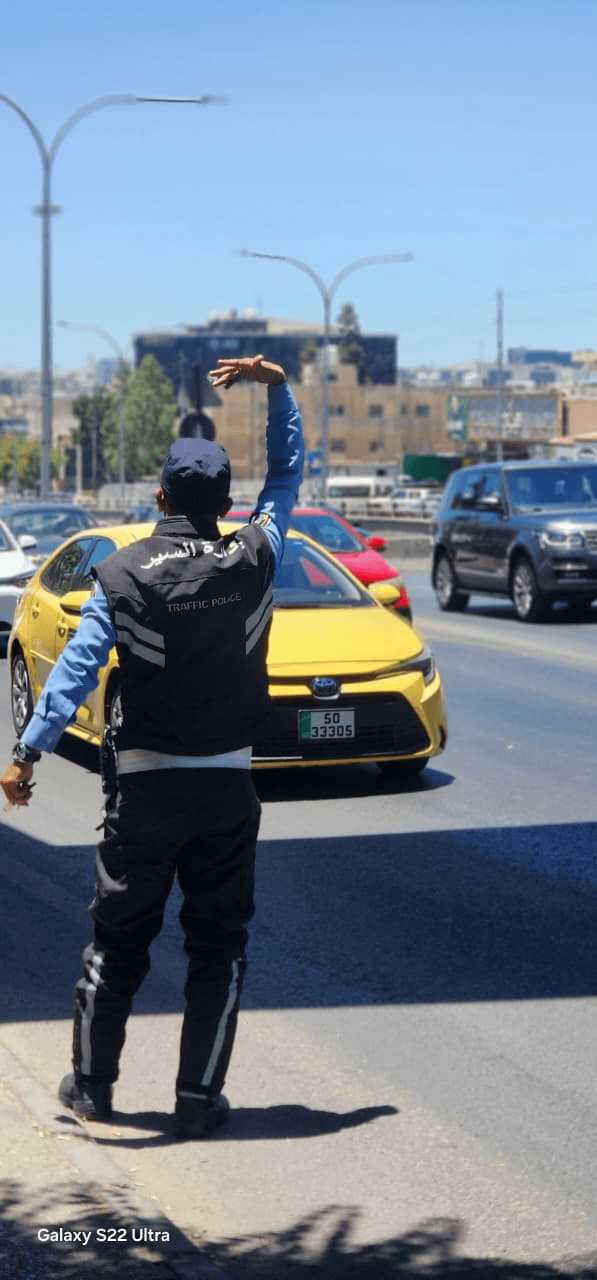 رقباء السير في الميدان.. جهود استثنائية لتأمين الطرقات في يوم "النشامى" المونديالي